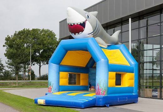 Buy standard bouncy castles with a 3D object of a shark on the top for children. Order bouncy castles online at JB Inflatables UK