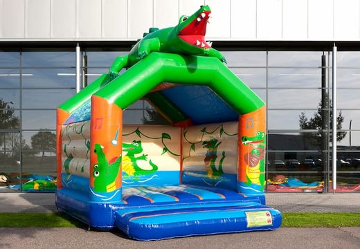 Buy standard bouncy castles with a 3D object of a crocodile at the top for children. Order bouncy castles online at JB Inflatables UK