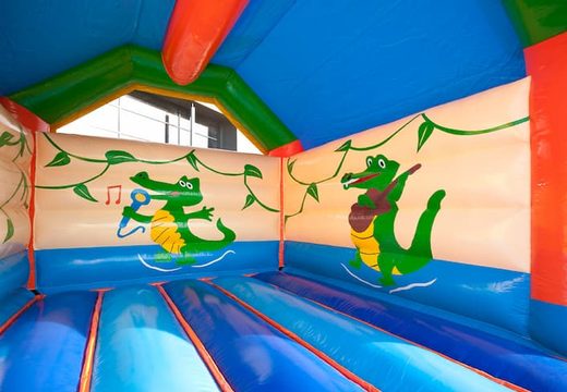 Buy standard bounce house with a 3D crocodile object on top for kids. Order bounce house online at JB Inflatables UK