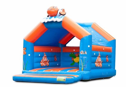 Buy a large indoor bouncy castle in a clownfish nemo theme for kids. Available at JB Inflatables UK online
