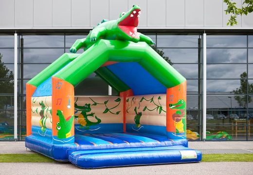 Buy a super bouncy castle covered with cheerful animations in crocodile theme for children. Order bouncy castles online at JB Inflatables UK