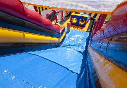Order a slide in the Fire Brigade World theme with 3D obstacles for kids. Buy inflatable slides now online at JB Inflatables UK