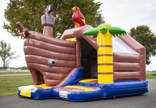 Inflatable slide combo bouncy castle in pirate theme to buy at JB Inflatables UK. Buy inflatable bouncy castles with slide for kids