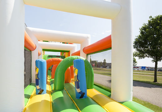 Buy soccer themed inflatable obstacle course with 7 game elements and colorful objects for kids now. Order inflatable obstacle courses now online at JB Inflatables UK