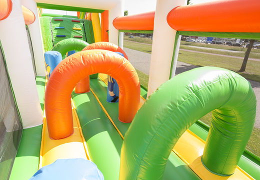 Order an inflatable football themed obstacle course with 7 game elements and colorful objects for kids. Buy inflatable obstacle courses online now at JB Inflatables UK