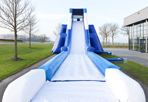 Spectacular inflatable monster slide 8 meters high and 54 meters long with a double staircase. Order inflatable slides now online at JB Inflatables UK