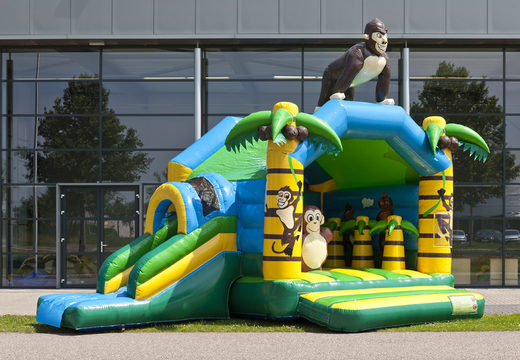 Buy an inflatable multifun bouncy castle with a jungle theme roof with a 3D object of a gorilla on top for kids at JB Inflatables UK. Order bouncy castles online at JB Inflatables UK