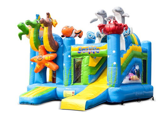 Buy indoor inflatable multiplay bouncy castle in the seaworld sea theme with slide for children. Order inflatable bouncy castles online at JB Inflatables UK