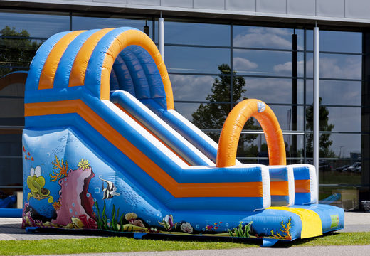 Buy Oceanworld slide with the cheerful colors and nice print on the back wall. Order inflatable slides now online at JB Inflatables UK