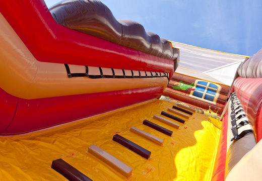 Large inflatable Pirates world slide with 3D obstacles for kids. Buy inflatable slides now online at JB Inflatables UK