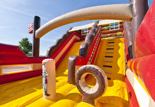 Order mega inflatable slide in theme Pirates world with 3D obstacles for kids. Buy inflatable slides now online at JB Inflatables UK