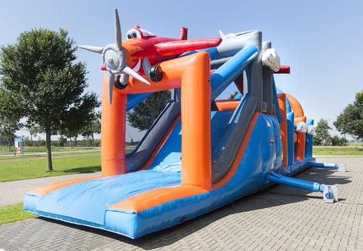 Plane run 17m obstacle course with 7 game elements and colorful objects for kids. Buy inflatable obstacle courses online now at JB Inflatables UK
