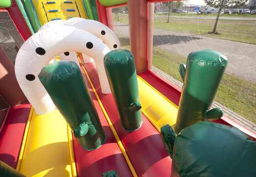 Unique cowboy themed obstacle course with 7 game elements and colorful objects to buy for kids. Order inflatable obstacle courses now online at JB Inflatables UK