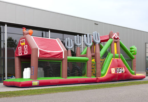 Buy a farm themed inflatable obstacle course with 7 game elements and colorful objects for children. Order inflatable obstacle courses now online at JB Inflatables UK
