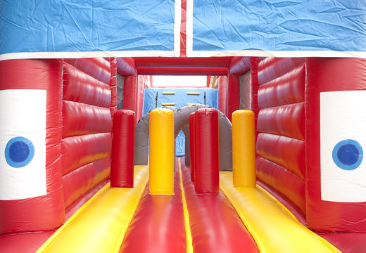 Unique 17 meter wide obstacle course in a fire department theme with 7 game elements and colorful objects for kids. Buy inflatable obstacle courses online now at JB Inflatables UK