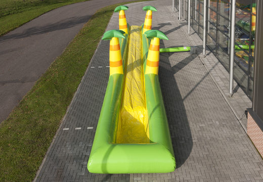 Spectacular inflatable jungle belly slide 16 meters long with an extra wide track for children. Buy inflatable belly slides now online at JB Inflatables UK