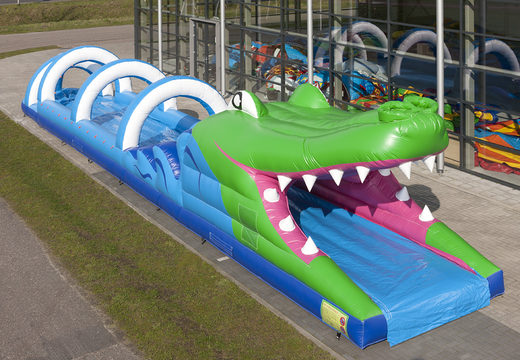Spectacular inflatable crocodile belly slide 18 meters long for kids. Buy inflatable belly slides now online at JB Inflatables UK