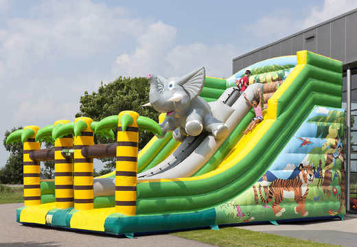 Buy jungle world themed inflatable slide with fun 3D figures and colorful prints for children. Order inflatable slides now online at JB Inflatables UK