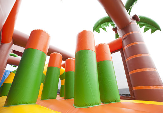 Buy jungle themed inflatable obstacle course with 7 game elements and colorful objects for children. Order inflatable obstacle courses now online at JB Inflatables UK