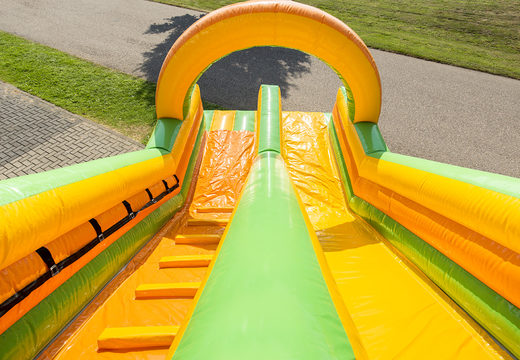 Buy a spectacular jungle-themed inflatable slide with fun prints for kids. Order inflatable slides now online at JB Inflatables UK