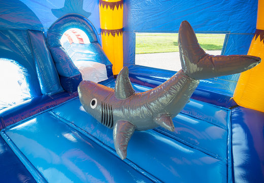Buy Maxifun super bouncy castle in bright colors and fun 3D figures in a shark theme at JB Inflatables UK. Order bouncy castles now online at JB Inflatables UK