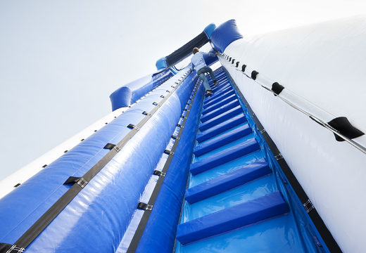 Get your inflatable inflatable monster slide 11 meters high and 53 meters long with a double staircase for children. Order inflatable slides now online at JB Inflatables UK