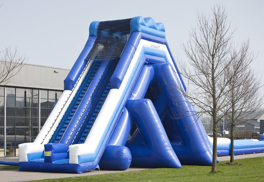 Buy the perfect inflatable slide 11 meters high and 53 meters long with a double staircase. Order inflatable slides now online at JB Inflatables UK