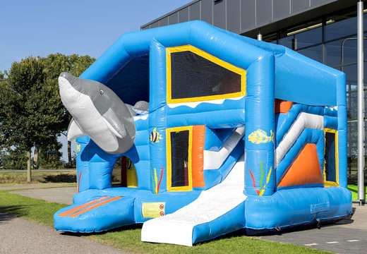 Medium inflatable multiplay bouncy castle in dolphin theme for children. Order inflatable bouncy castles online at JB Inflatables UK