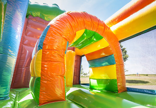 Medium inflatable fairytale-themed bouncy castle with slide for children. Order inflatable bouncy castles online at JB Inflatables UK