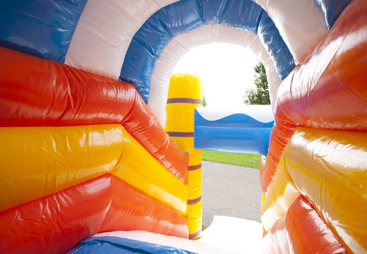 Multiplay clownfish bounce house with a slide, fun objects on the jumping surface and striking 3D objects for children. Order inflatable bounce houses online at JB Inflatables UK