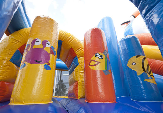 Medium inflatable multiplay bouncy castle in nemo theme with slide for children. Order inflatable bouncy castles online at JB Inflatables UK