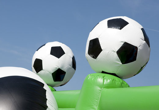 Football themed bouncy castle with slide, fun objects on the jumping surface and striking 3D objects for children. Buy inflatable bouncy castles online at JB Inflatables UK