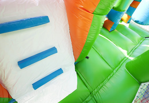 Multiplay soccer bouncer with a slide, fun objects on the jumping surface and striking 3D objects for children. Order inflatable bouncers online at JB Inflatables UK