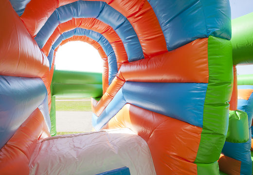 Buy a medium inflatable multiplay bounce house in football theme with slide for children. Order inflatable bounce houses online at JB Inflatables UK
