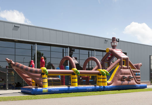 Buy a 17-metre-wide pirate-themed inflatable obstacle course with 7 game elements and colorful objects for kids. Order inflatable obstacle courses now online at JB Inflatables UK
