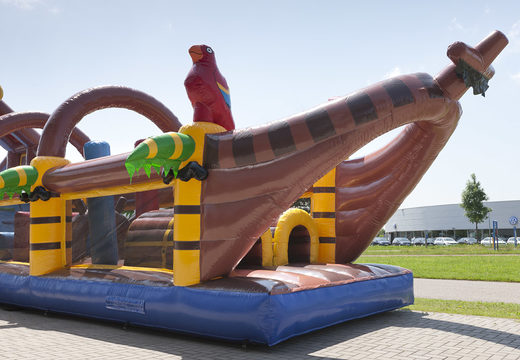 Unique 17 meter wide pirate themed obstacle course with 7 game elements and colorful objects for kids. Buy inflatable obstacle courses online now at JB Inflatables UK