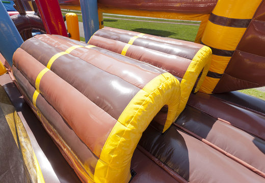 Pirate themed inflatable obstacle course with 7 game elements and colorful objects for kids buy now. Order inflatable obstacle courses now online at JB Inflatables UK