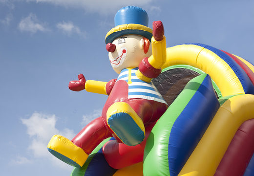 Buy a unique multifunctional clown themed inflatable slide with a splash pool, impressive 3D object, fresh colors and the 3D obstacle for children. Order inflatable slides now online at JB Inflatables UK