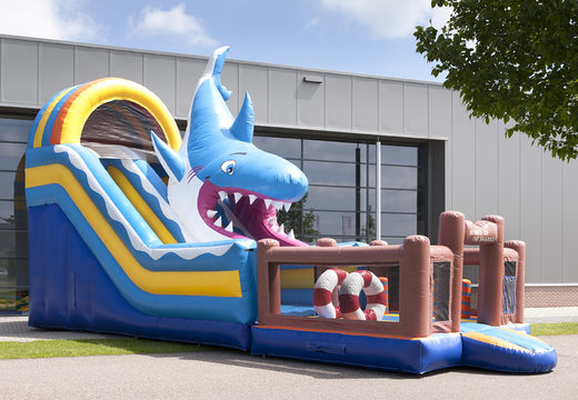 Unique shark-themed inflatable slide with a splash pool, impressive 3D object, fresh colors and the 3D obstacles for children. Order inflatable slides now online at JB Inflatables UK