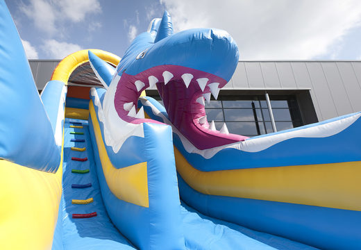 Buy a unique multifunctional shark themed inflatable slide with a splash pool, impressive 3D object, fresh colors and the 3D obstacle for children. Order inflatable slides now online at JB Inflatables UK