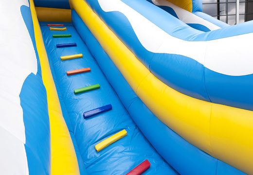 Inflatable slide with a clownfish theme with a splash pool, impressive 3D object, fresh colors and the 3D obstacle for children. Order inflatable slides now online at JB Inflatables UK