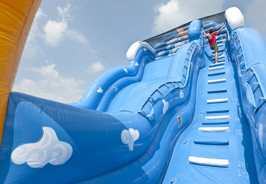 Wave inflatable slide with wavy sliding surface and fun underwater world prints for children. Buy inflatable slides now online at JB Inflatables UK