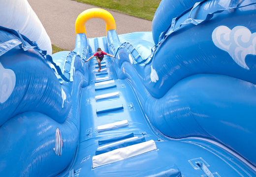 Order an inflatable wave-themed slide with a wavy sliding surface and fun underwater world prints for kids. Buy inflatable slides now online at JB Inflatables UK