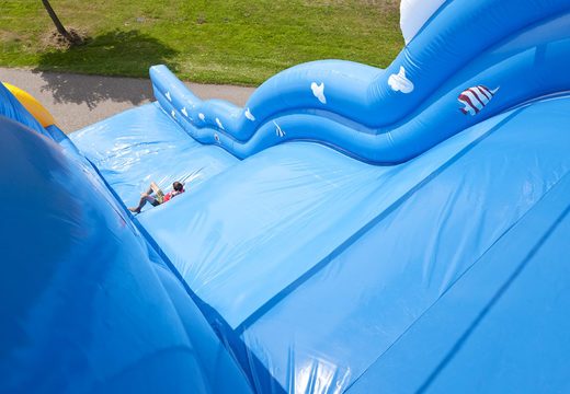 Buy a Wave themed slide with a wavy sliding surface and fun underwater world prints for kids. Order inflatable slides now online at JB Inflatables UK