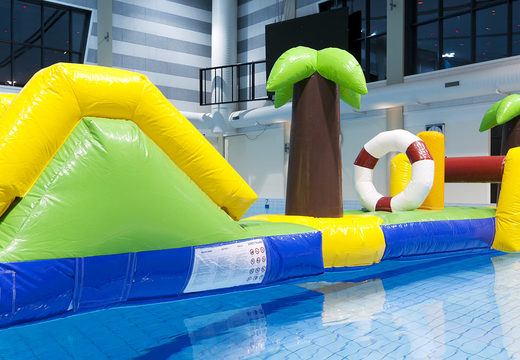 Hawaii run 12m long inflatable assault course with 2 slides for both young and old. Order inflatable water attractions now online at JB Inflatables UK