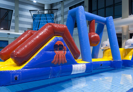Inflatable marine run water assault course with 3D dolphins and cool prints for both young and old. Order inflatable obstacle courses online now at JB Inflatables UK