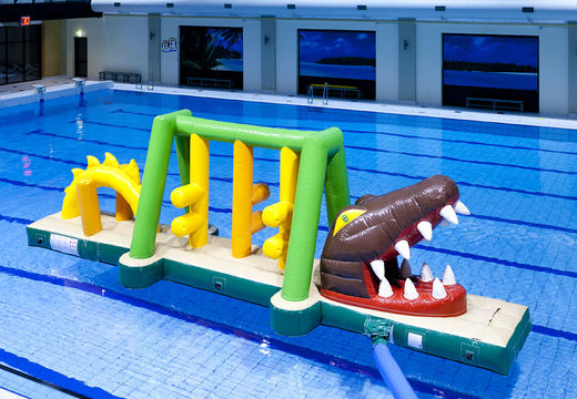 Crocodile run inflatable obstacle course with fun objects for both young and old. Order inflatable obstacle courses online now at JB Inflatables UK