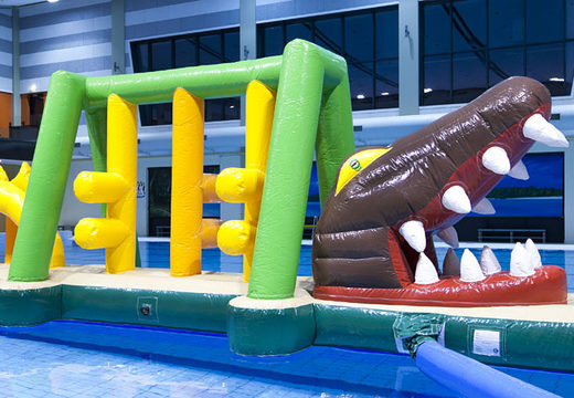 Buy a unique inflatable obstacle course in a crocodile theme with fun objects for both young and old. Order inflatable pool games now online at JB Inflatables UK
