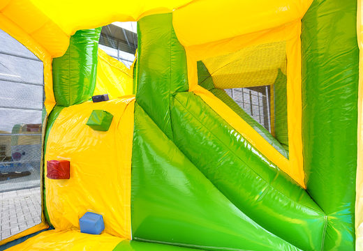 Multiplay Happy jungle bouncer with a slide for children. Buy inflatable bouncers online at JB Inflatables UK