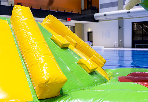 Buy an inflatable airtight crocodile play island with a vine, climbing tower, round slide and obstacles for both young and old. Order inflatable pool games now online at JB Inflatables UK